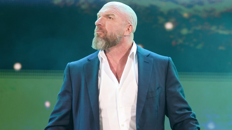 Triple H wearing a suit