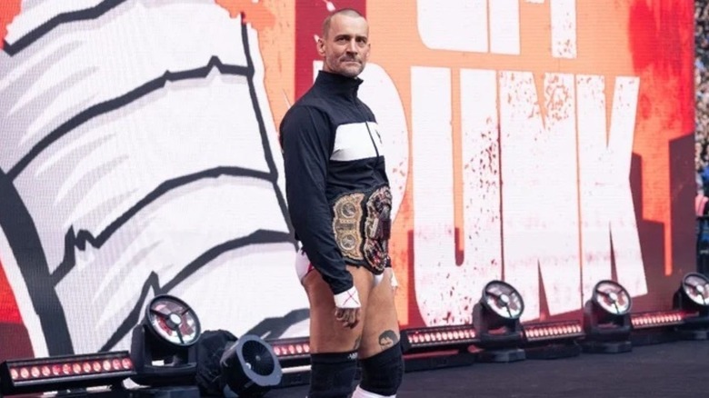 CM Punk stands on the stage