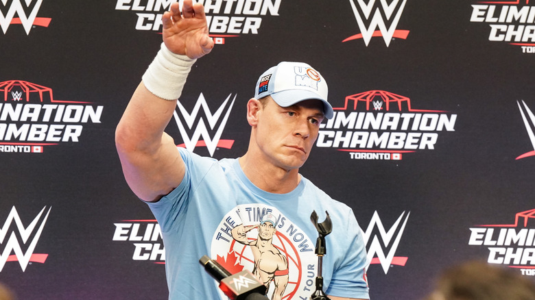 John Cena dropping his mic during the Elimination Chamber WWE Post Show