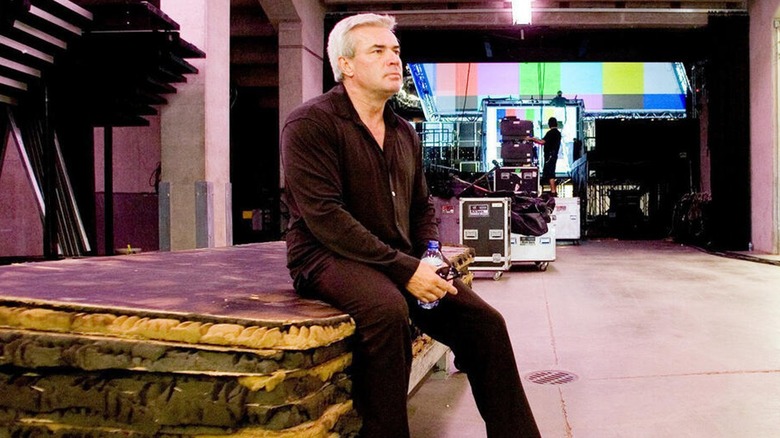 Eric Bischoff sitting backstage