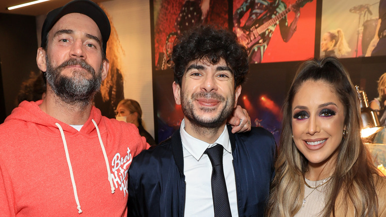 Tony Khan with Britt Baker and CM Punk 