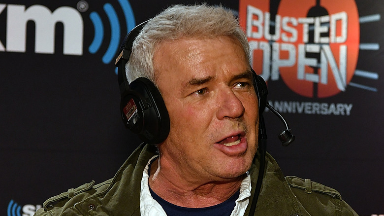 Eric Bischoff wearing headset on the set of Busted Open Radio