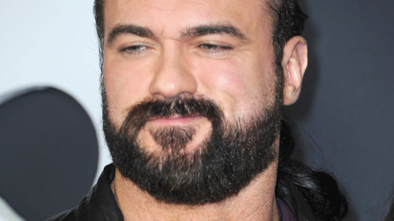 Drew McIntyre smirks