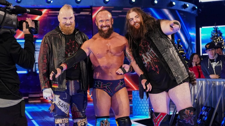 Alexander Wolfe, Eric Young, and Killian Dain as "SAnitY"