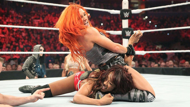 Becky Lynchs uses dis-arm-her on Alicia Fox