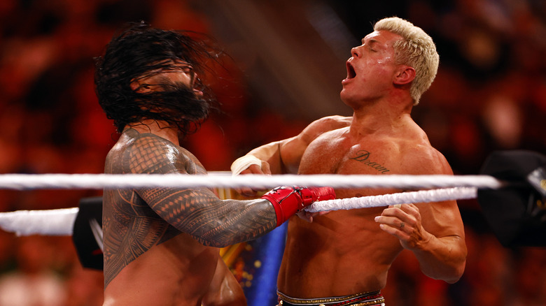 Roman Reigns and Cody Rhodes in the throes of combat