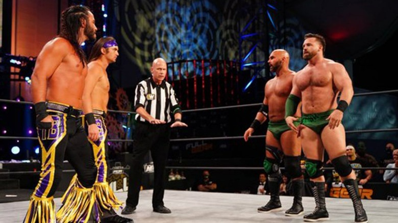 The Young Bucks in the ring with FTR