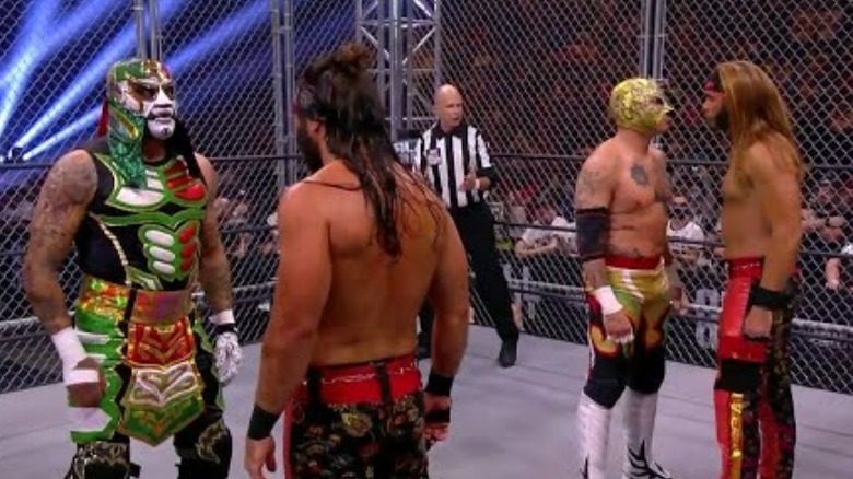 The Young Bucks in the ring with the Lucha Brothers