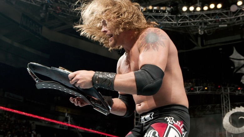 Edge holding WWE Championship