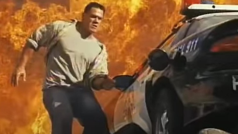 John Cena runs from explosion