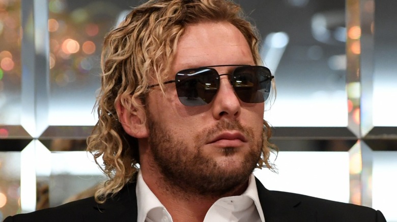 Kenny Omega wearing sunglasses