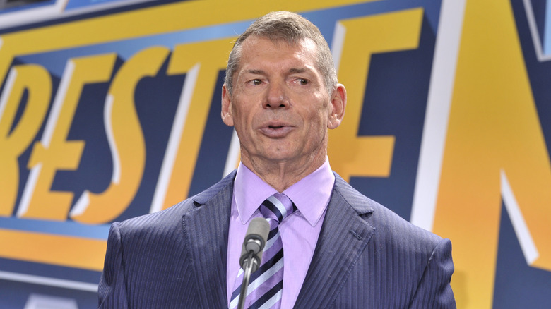 Vince McMahon speaking at an event