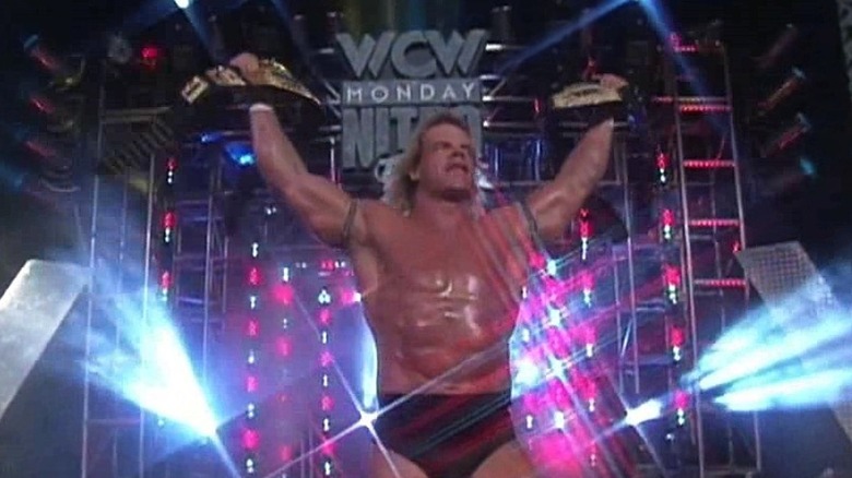 Lex Luger with two WCW titles