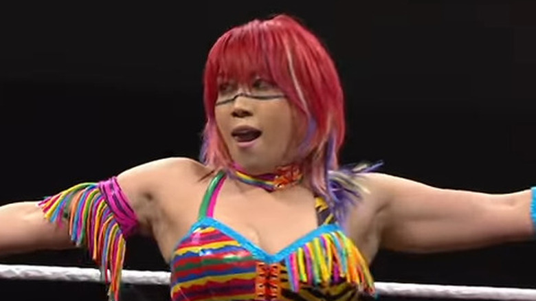 Asuka arms outstretched