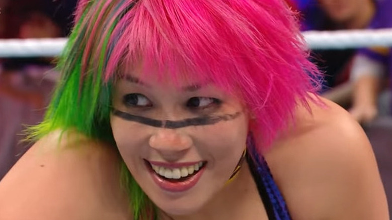 Asuka smiling pink hair
