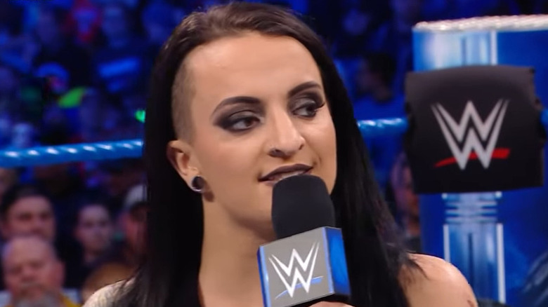 Ruby Riott holding a microphone inside the ring