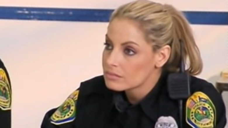 Trish Stratus in cop outfit