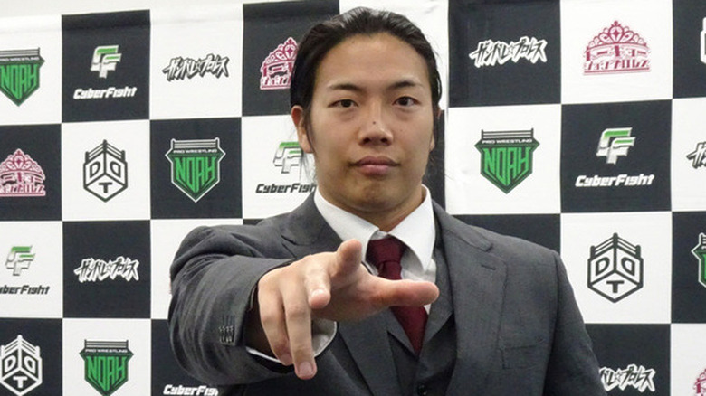 Konosuke Takeshita in suit
