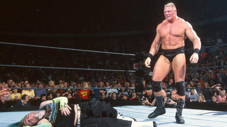 Brock Lesnar stands over Jeff Hardy