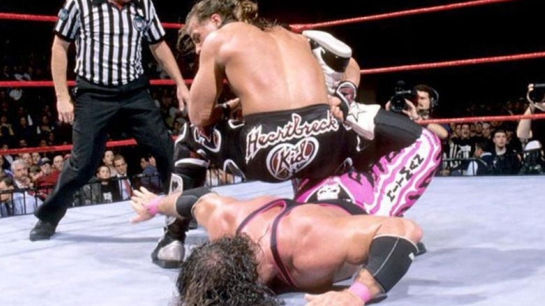 Shawn Michaels puts Bret Hart in the Sharpshooter