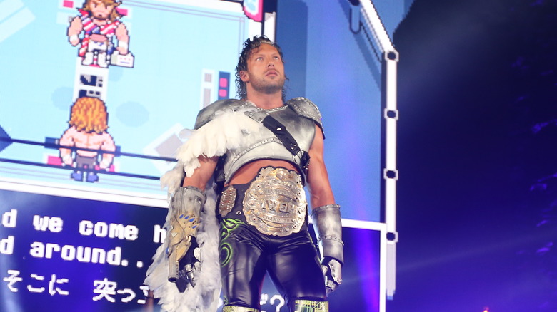 Kenny Omega walking down to the ring