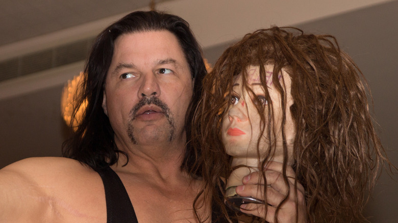 Al Snow holds Head