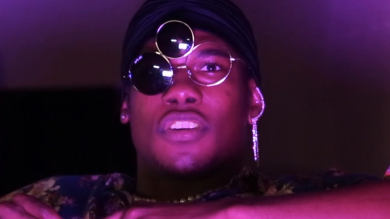 Velveteen Dream in purple light