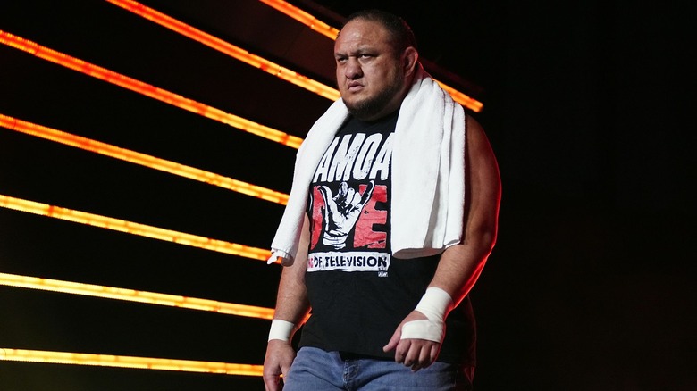 Samoa Joe glares forward as he makes his entrance.