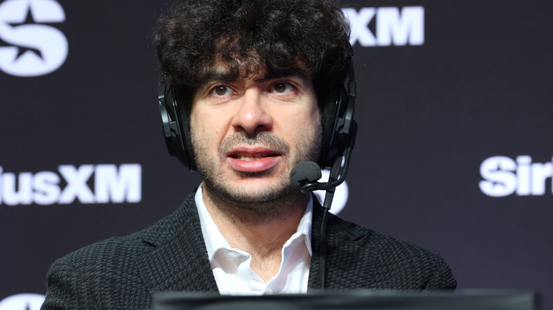 Tony Khan speaks on SiriusXM at Super Bowl LVIII on February 08, 2024 in Las Vegas, Nevada.