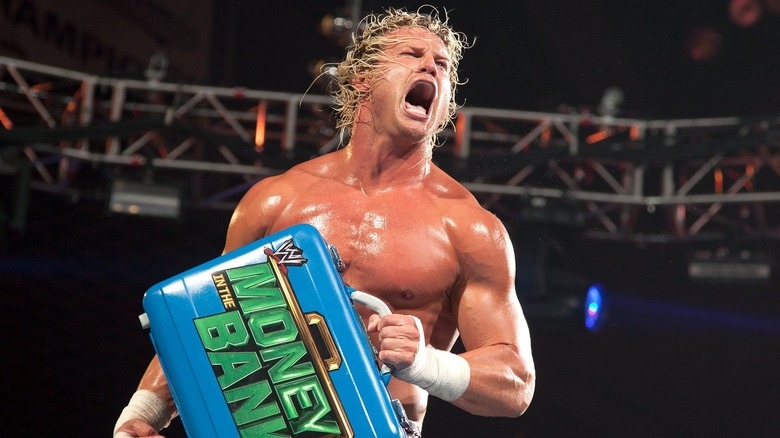 Dolph Ziggler holding Money in the Bank briefcase