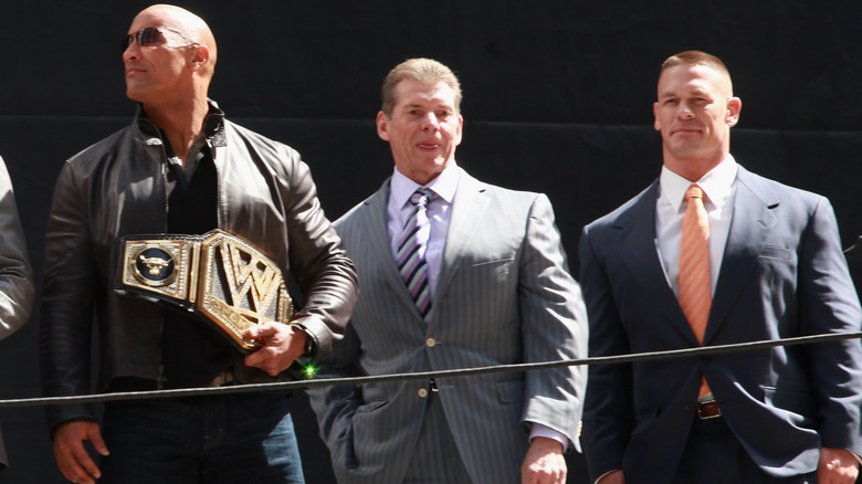 Vince McMahon with The Rock and John Cena