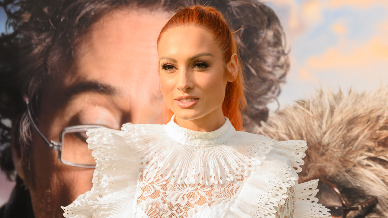 Becky Lynch in a white dress