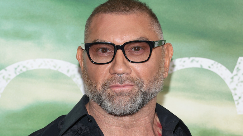 Dave Bautista wearing black-rimmed glasses