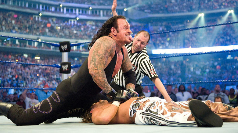 Marty Elias counts the pinfall during Undertaker vs. Shawn Michaels