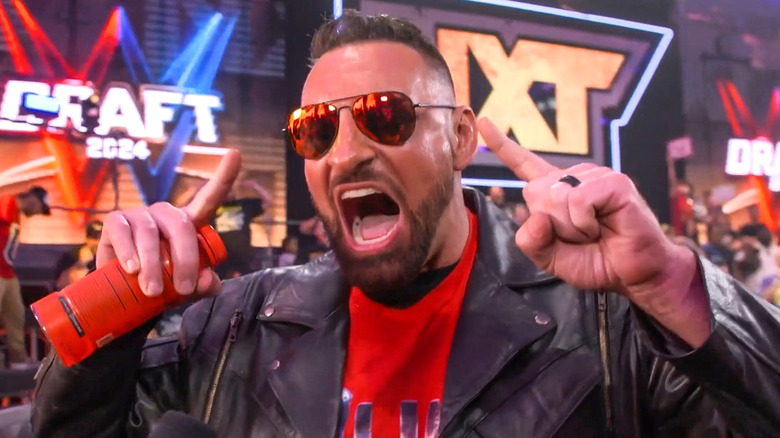 Dijak wears sunglasses during 2024 WWE draft