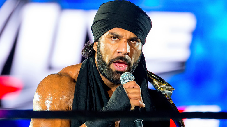 Jinder Mahal with a mic