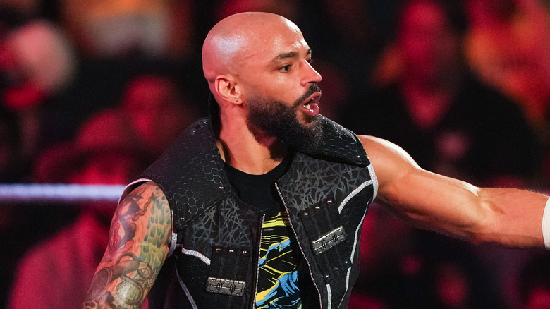 Ricochet looking around for a tag team partner