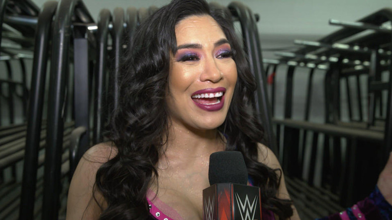 Melina smiling