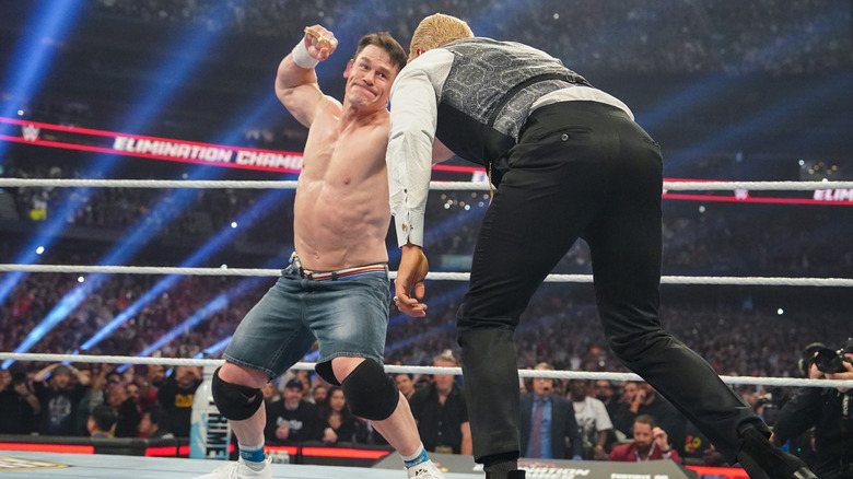 John Cena attacking Cody Rhodes