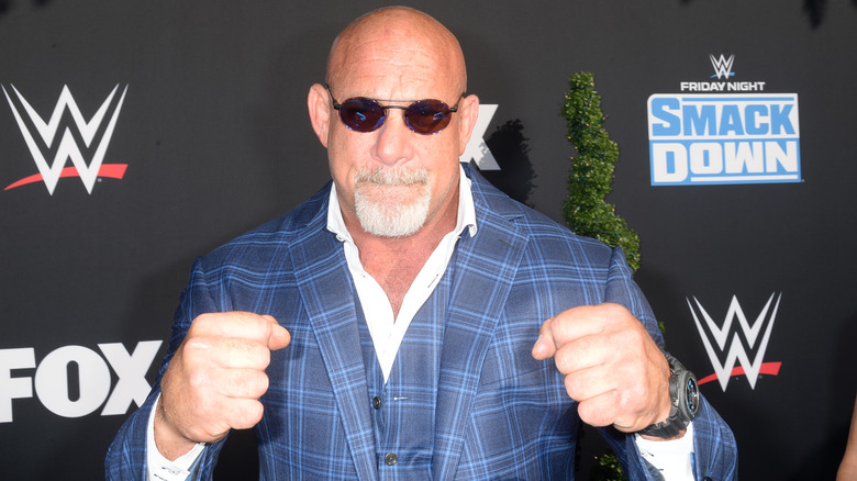 Bill Goldberg raising his fists and posing