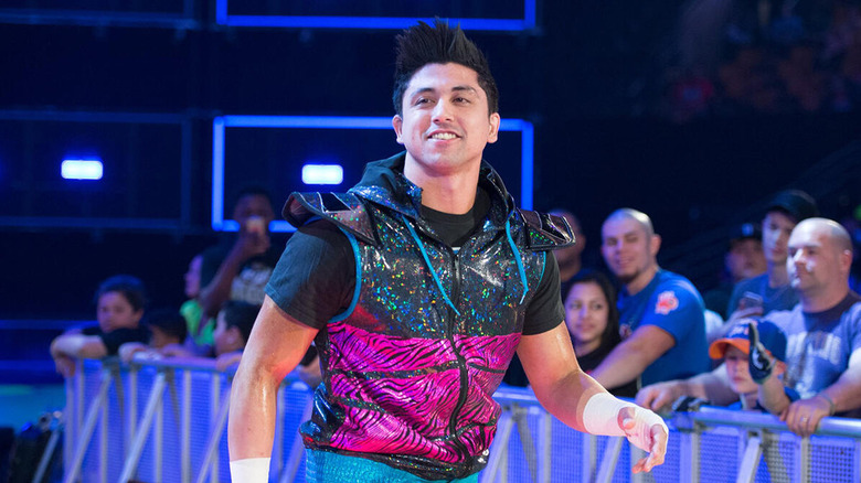 TJ Perkins walks to the ring