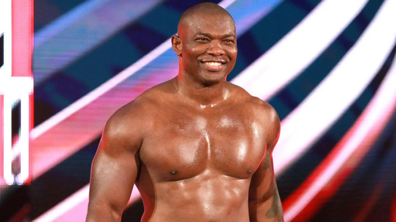 Shelton Benjamin is smiling widely.