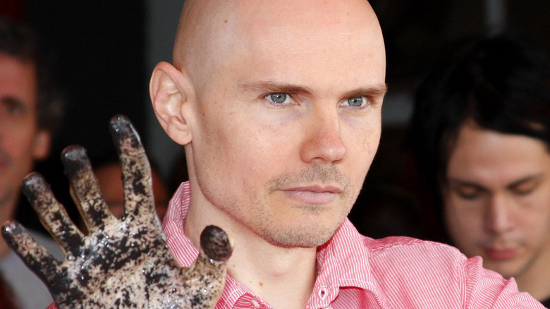 Billy Corgan shows off stained hands