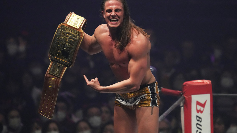 Matt Riddle holds up title