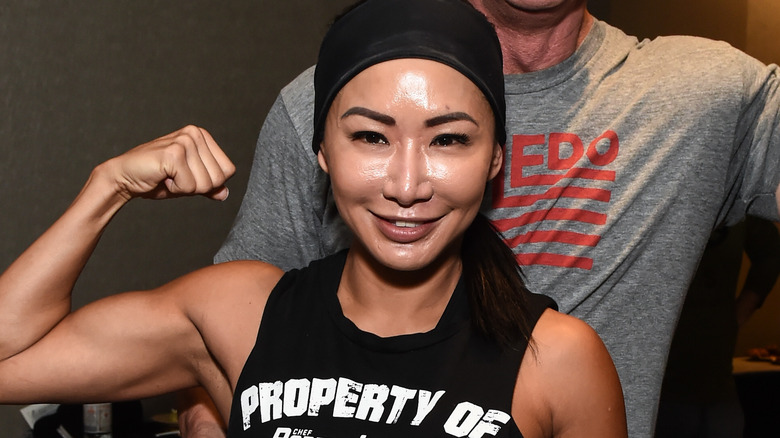 Gail Kim flexing