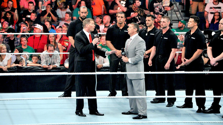 John Laurinaitis talks to Vince McMahon