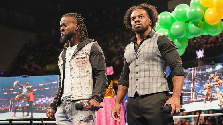 Kofi Kingston and Xavier Woods mean-mugging in the ring