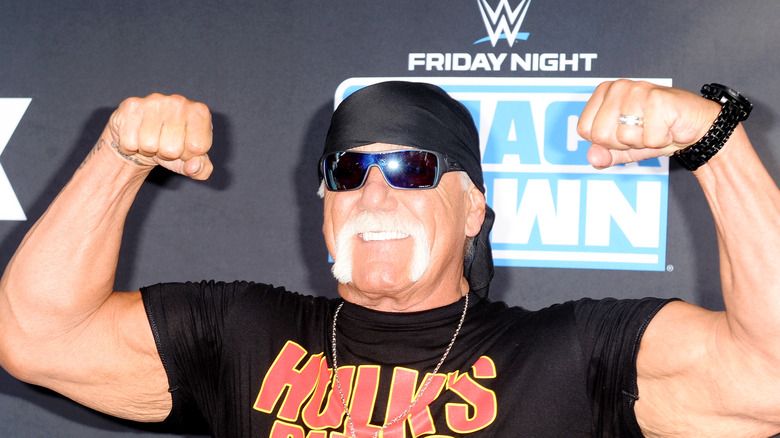 Hulk Hogan flexing his muscles at the premiere of "WWE SmackDown" on FOX