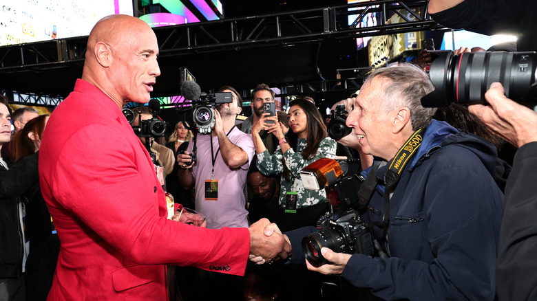 The Rock shares a drink with George Napolitano