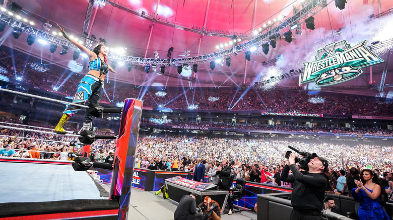 Bayley poses on the ropes